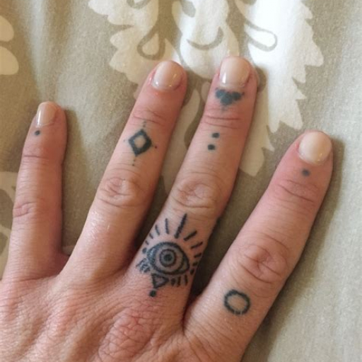 Stick and Poke Finger Tattoo Ideas Stick and Poke Finger Tattoo Ideas